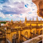 Aerial view of Seville city and Cathedral of Saint Mary of the See in Seville, Andalusia, Spain, Europe