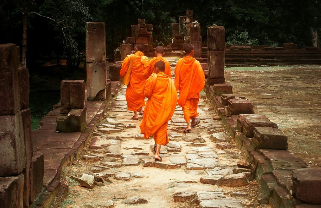 Cambodia Tours From USA / Buddhist monks inside Baphuon temple, Siem Reap - Cambodia