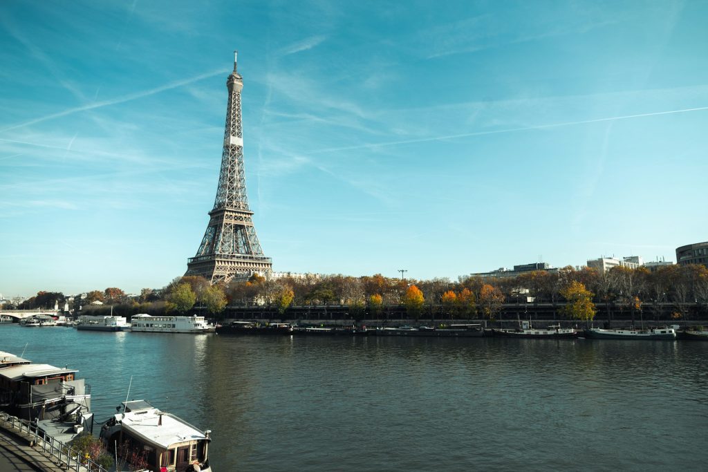 Escorted Tours France / The Eiffel Tower standing over the Sienne River